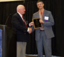 Mark Flynn presents award to Maurice King