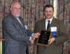 Mark Flynn presents award to Doug Repman
