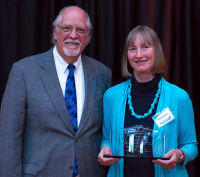 Kim Herman presents Sevy Award to Deborah Winter